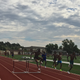 Stanley Kebenei clears hurdles on a lap of 25 x 400 workout